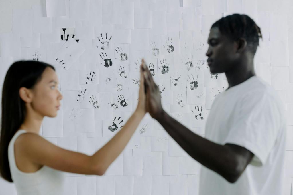 couple holding open hands