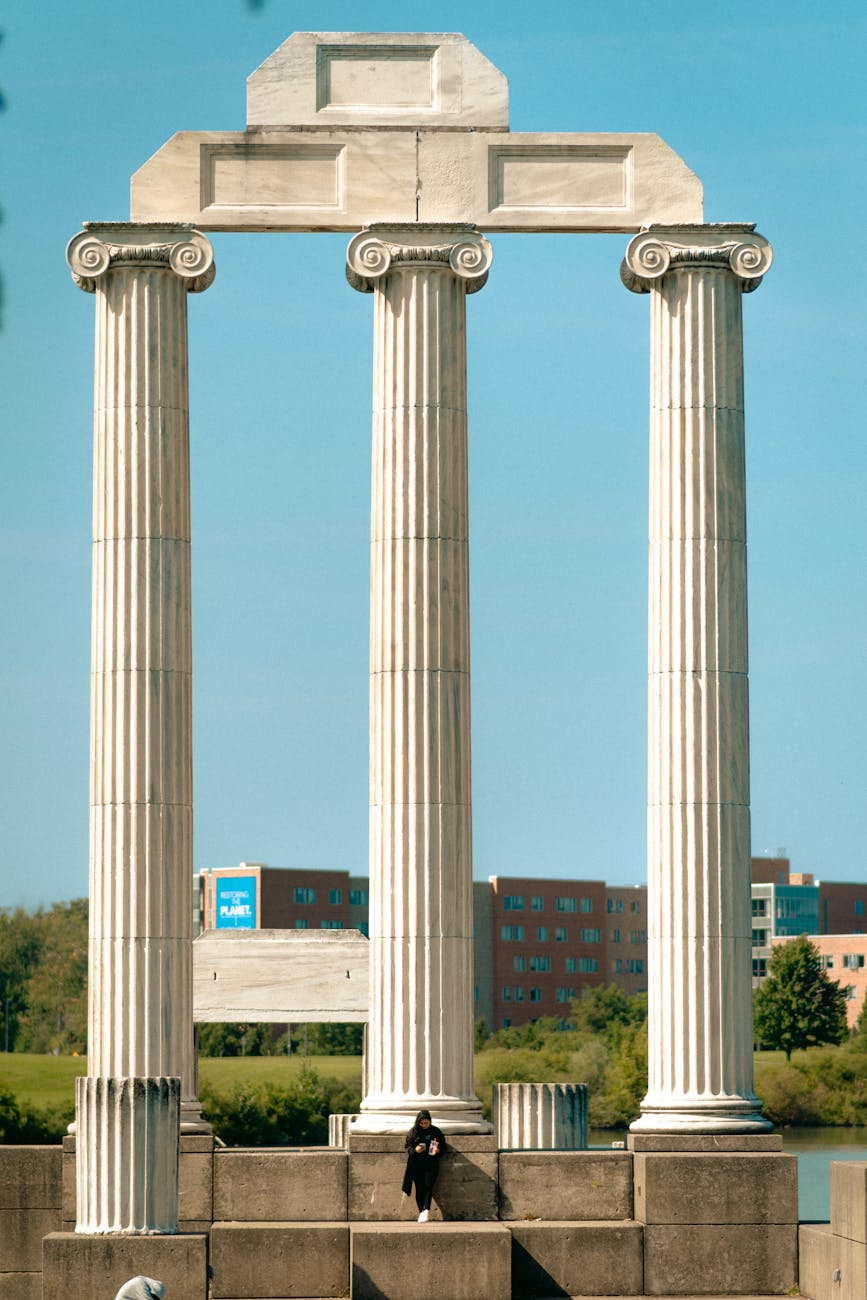majestic ancient columns in urban landscape neuroaffirming trauma-informed care